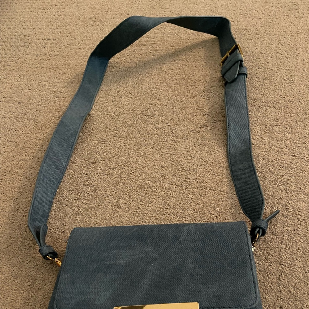 New blue strap purse